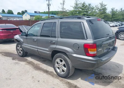 2004 Jeep Grand Cherokee Overland z USA, uszkodzony, nr VIN 1J8GW68J14C312578